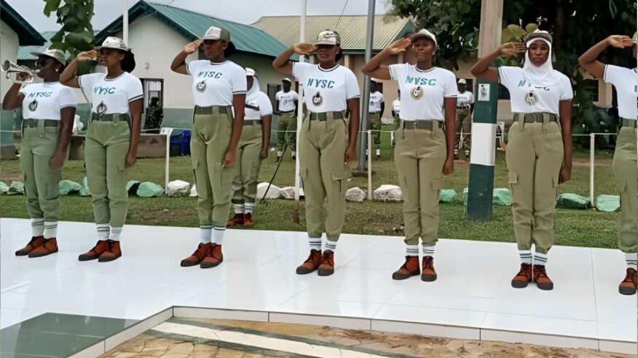 Corps members general salute during the NYSC registration process.